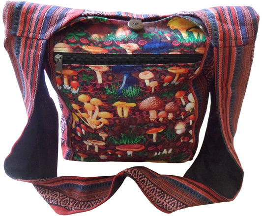 Cotton textile shoulder bag with stunning printed mushroom design to the front on canvas with sides, strap & back made up of coloured gheri cotton. Gheri fabric is sturdy & is woven using an age-old weaving technique on backstrap looms. Fully lined. Zip to inside top of bag & button fastening to front. 2 pockets, one pocket inside with zip fastening & one front pocket with zip fastening.