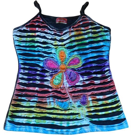 Main Image: Cotton jersey flower razor cut vest top in multicolour tie dye panels to front of the top with applique flowers and embroidery. Plain charcoal colour to the back of garment. Stretch cotton for comfort & ease of wear.  Available in M, L & XL.