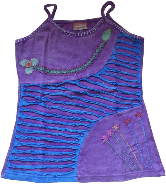 Main Image: Cotton Jersey Flower & Razor Cut Top  Benefits & Features: Hand embroidered flowers & applique flowers to the front in muted colours. Razor cut panel to the central body using a contrasting colour. Plain purple colour to the back of garment. Stretch cotton for comfort & ease of wear.