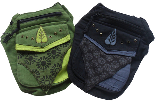 Main image – Handmade Green or Black Leaf Design Utility Belt with adjustable waist strap. 100% good quality heavy duty cotton & lined pockets. 5 pockets in total with either zip or press stud fastenings. Great for Outdoor Events, Festivals, Fishing, Tourism & Travel.