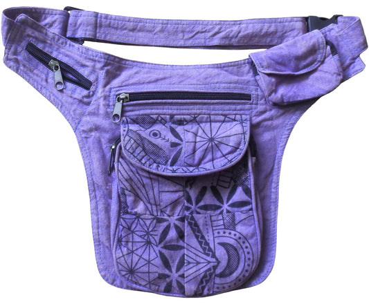 Main image - 100% Cotton Utility Travel Belt. The Strap has an adjustable buckle to lengthen or shorten the Belt. Features 100% good quality heavy duty cotton. Colour is Purple/Lilac with a stone washed effect. Printed floral/moon/geometric design to front pocket. 1/2 Lined Pockets. 5 pockets in total, 4 with zip fastenings & 1 with zip & press stud. Great for Outdoor Events, Festivals, Fishing, Tourism & Travel.