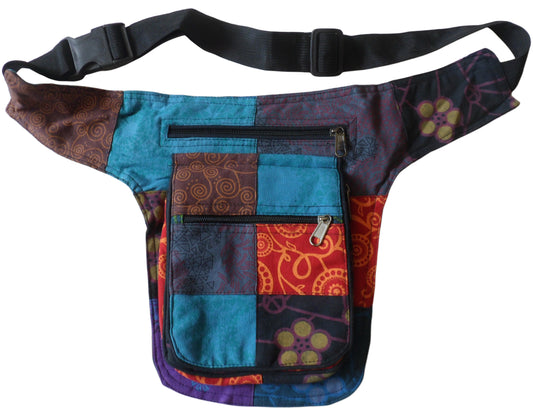 Main image – Handmade patchwork Utility Belt with adjustable waist strap. 100% good quality heavy duty cotton & lined pockets. 4 pockets in total, 3 with zip fastenings & 1 with zip & press stud.  Great for Outdoor Events, Festivals, Fishing, Tourism & Travel.
